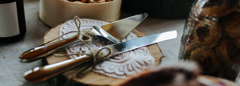 Cake server & knife on wood coaster