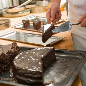 Chocolate cake on metal cake server